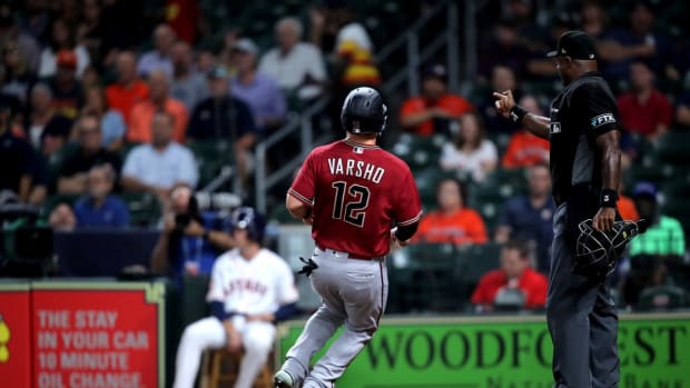 Sep 28, 2022; Houston, Texas, USA; Arizona Diamondbacks center fielder Daulton Varsho (12) crosses home plate to score a run against the Houston Astros during the first inning at Minute Maid Park. Mandatory Credit: Erik Williams-USA TODAY Sports
